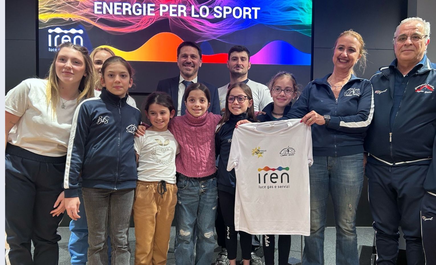 Persone alla presentazione dell'evento "Energie per lo sport"