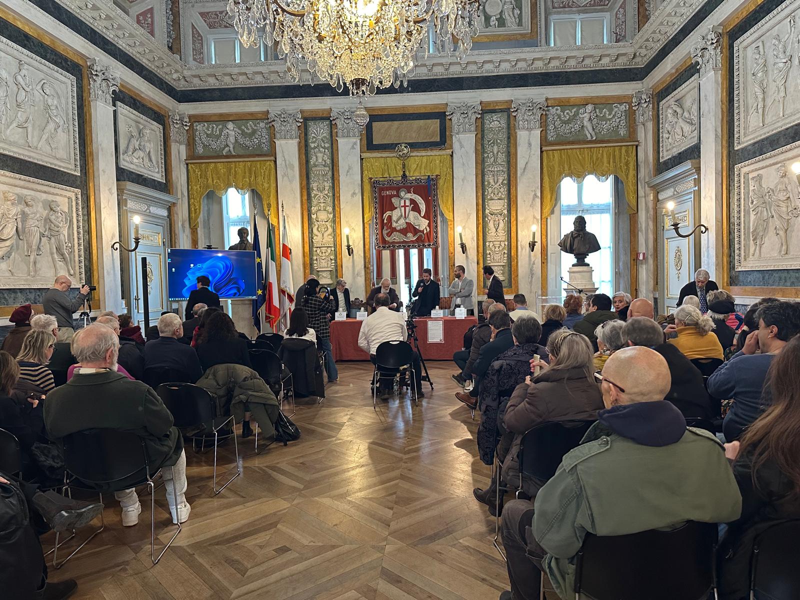 Pienone nella sala del comune di Genova per il discusso docufilm filo Russia messo al bando